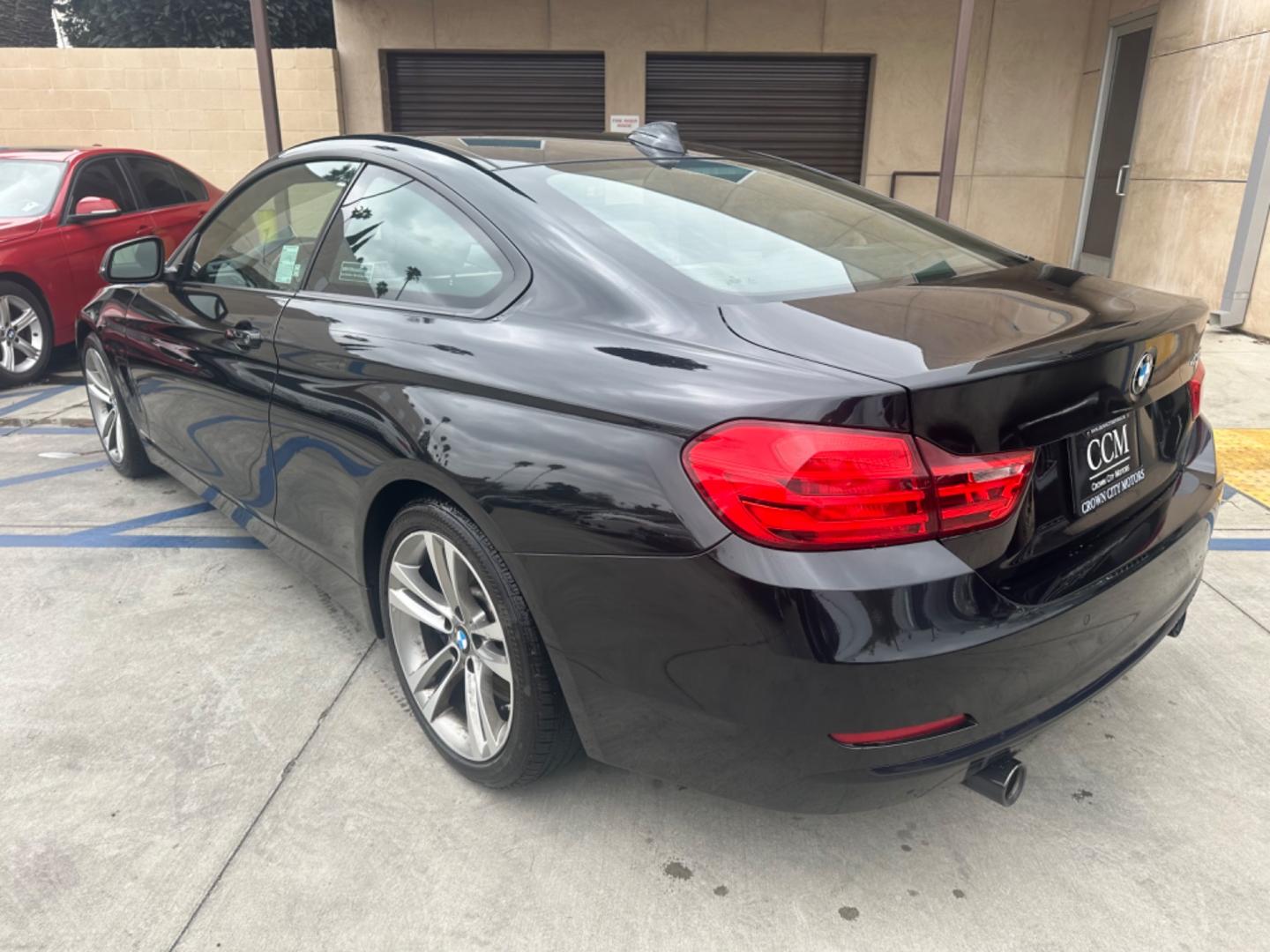 2015 Black BMW 4-Series 435i coupe (WBA3R1C55FK) with an 3.0L V6 DOHC 24V engine, 8-Speed Automatic transmission, located at 30 S. Berkeley Avenue, Pasadena, CA, 91107, (626) 248-7567, 34.145447, -118.109398 - Crown City Motors is a used “Buy Here Pay Here” car dealer in Pasadena CA. “Buy Here Pay Here” financing, means that when you purchase your vehicle from our dealership, that you make the payments to the dealership as well. We do not need the banks approval to get you approved for a used auto - Photo#2